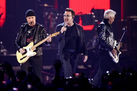 The Edge, Bono, Adam Clayton