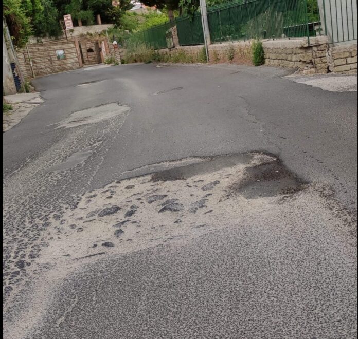 asfalto a metà