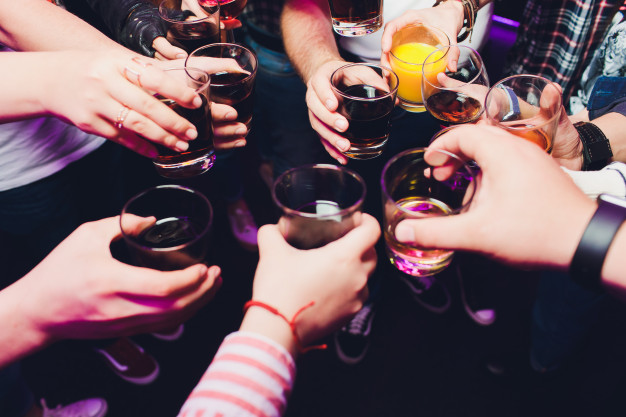 clinking-glasses-with-alcohol-toasting-party-congratulations-event-cheerful-party-friends_152904-2336